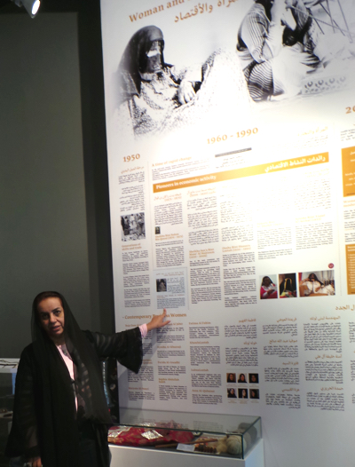 Prof. Rafia Ghubash explaining women's historical roles as exhibited in the Women's Museum