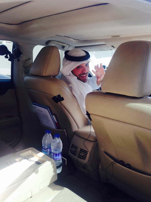 Khalid Al Ameri getting in his Careem car for his work-shift